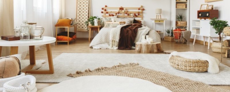How to keep an area rug from bunching up on carpet (the easy way)
